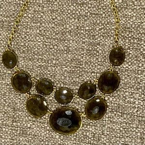 Necklace - dress it up or down. Crystal-like sheer black glass with gold chain.